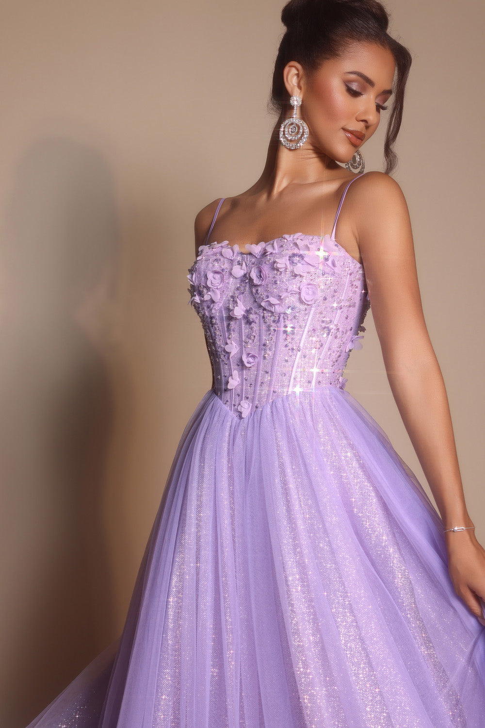 Portia and Scarlett PS26146 Lilac prom dress with a fitted bodice, floral embellishments, and a flowing skirt.