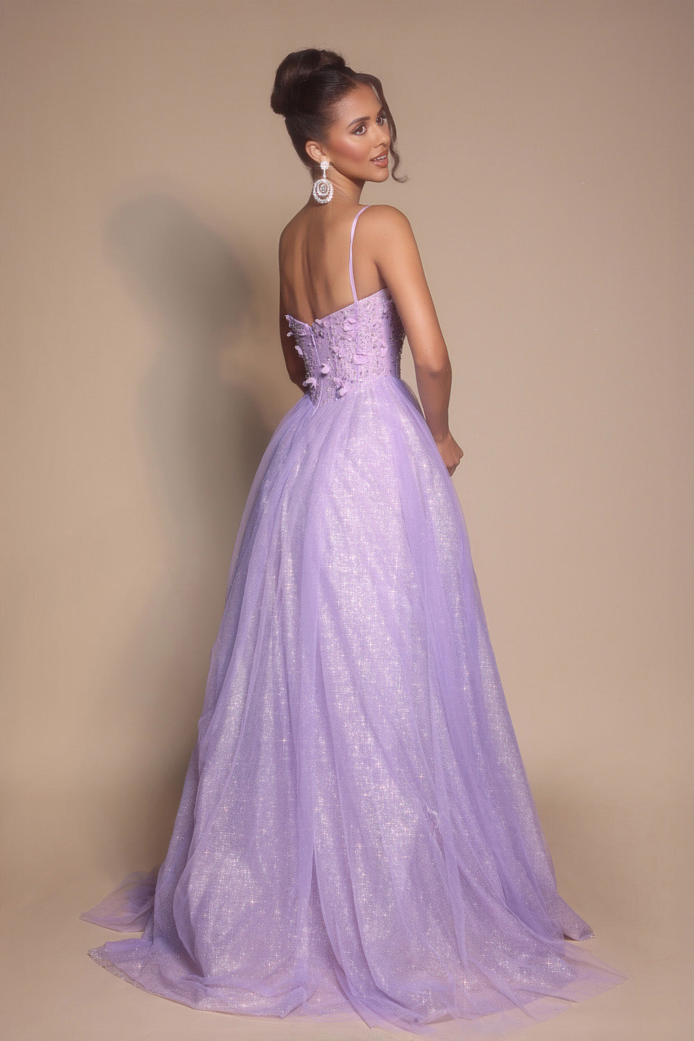 Portia and Scarlett PS26146 Lilac prom dress with a fitted bodice and lace-up back, featuring a flowing skirt.
