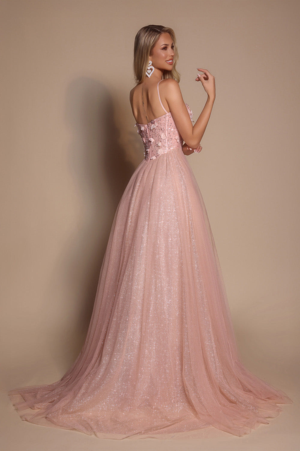 Portia and Scarlett PS26146 Pink formal gown with a fitted bodice and flowing skirt, featuring a lace-up back.