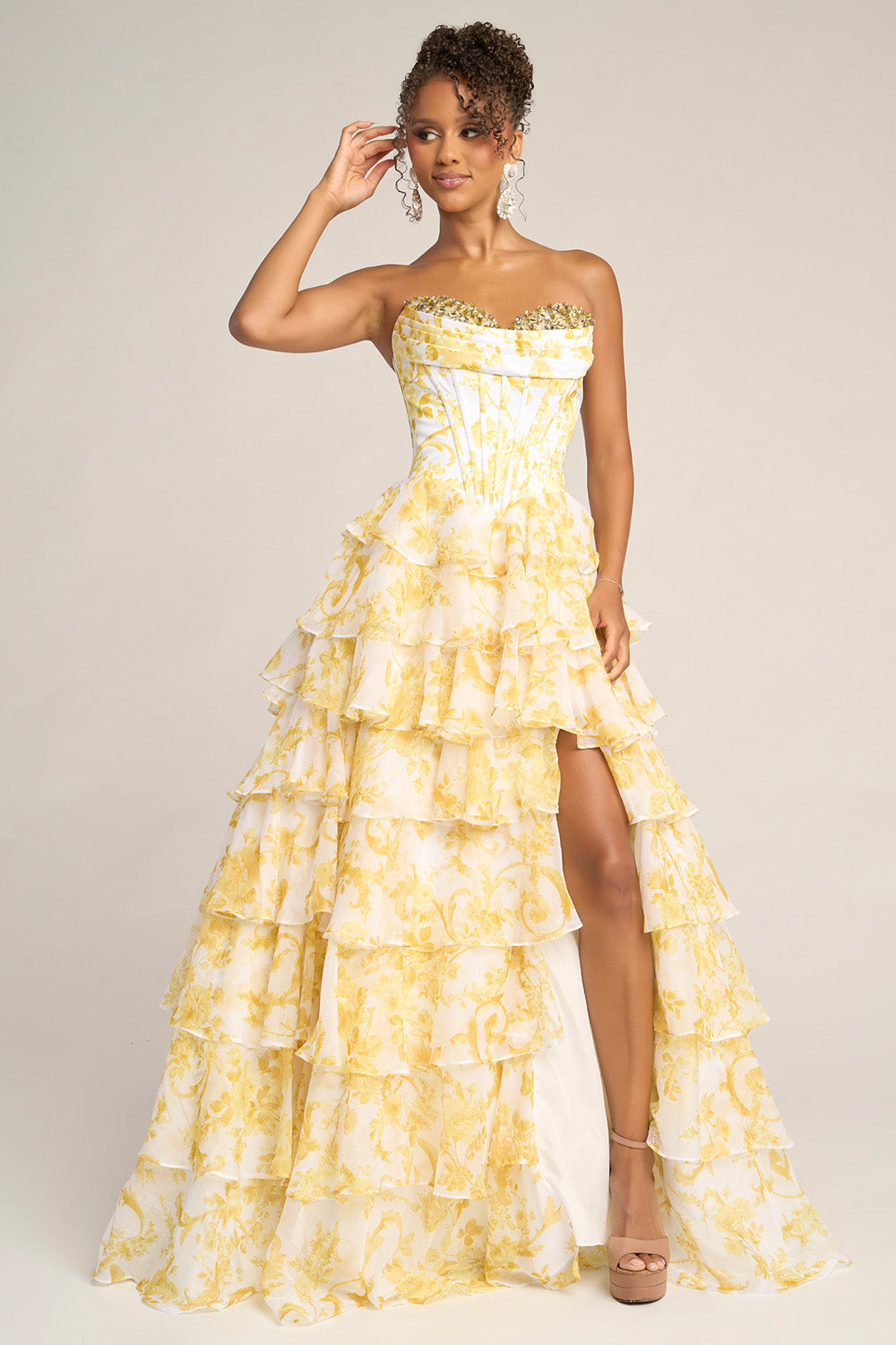 Portia and Scarlett PS26210 Strapless yellow prom dress with ruffled layers and a thigh-high slit.