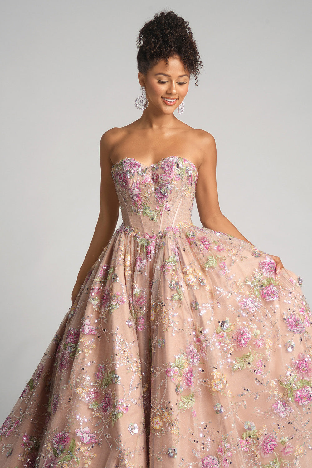 Portia and Scarlett PS26215 Strapless rose prom dress with floral embellishments and a full ballgown silhouette.