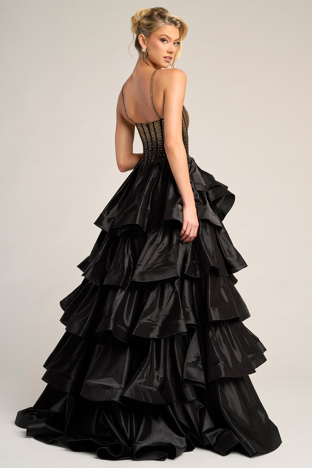 Portia and Scarlett PS26253 Black ballgown with layered ruffles and a beaded corset back, perfect for prom prom dress.