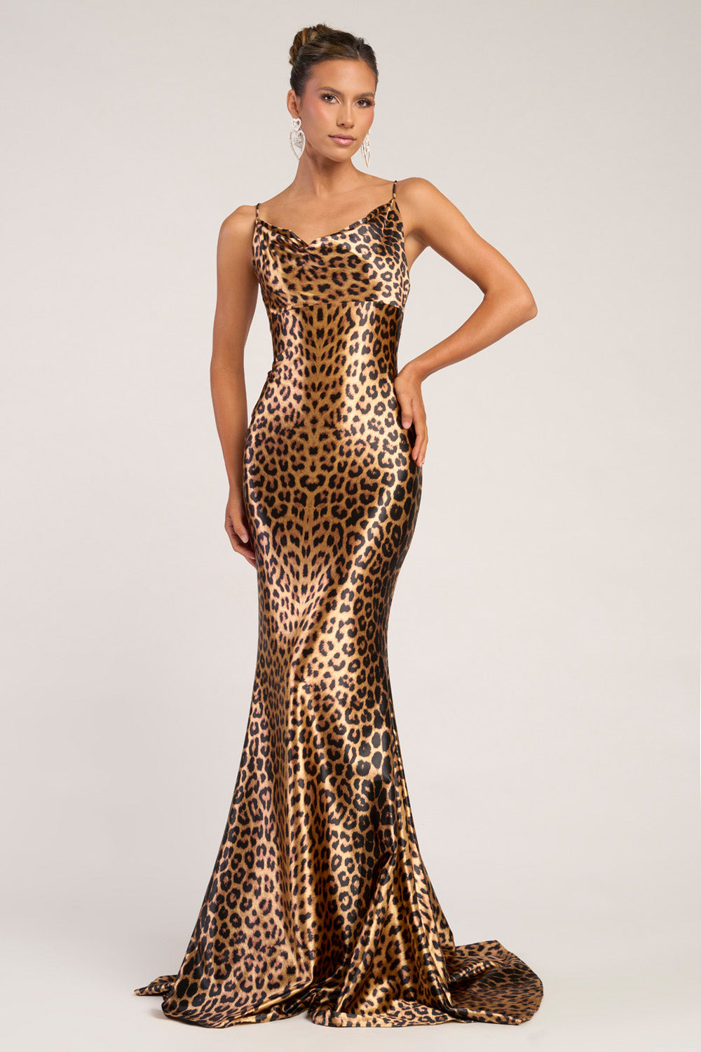 Portia and Scarlett PS26257 Leopard prom dress with a fitted silhouette and elegant side slit.
