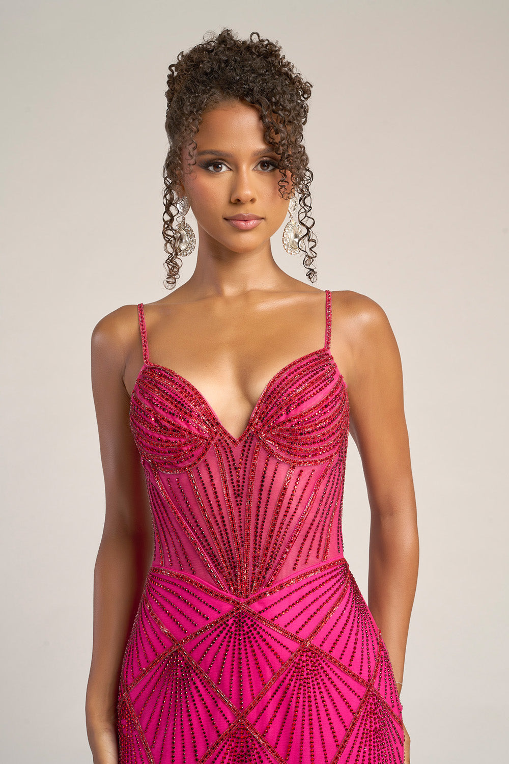 Portia and Scarlett PS26263 Fuchsia red prom dress with beading and a fitted silhouette, front view.