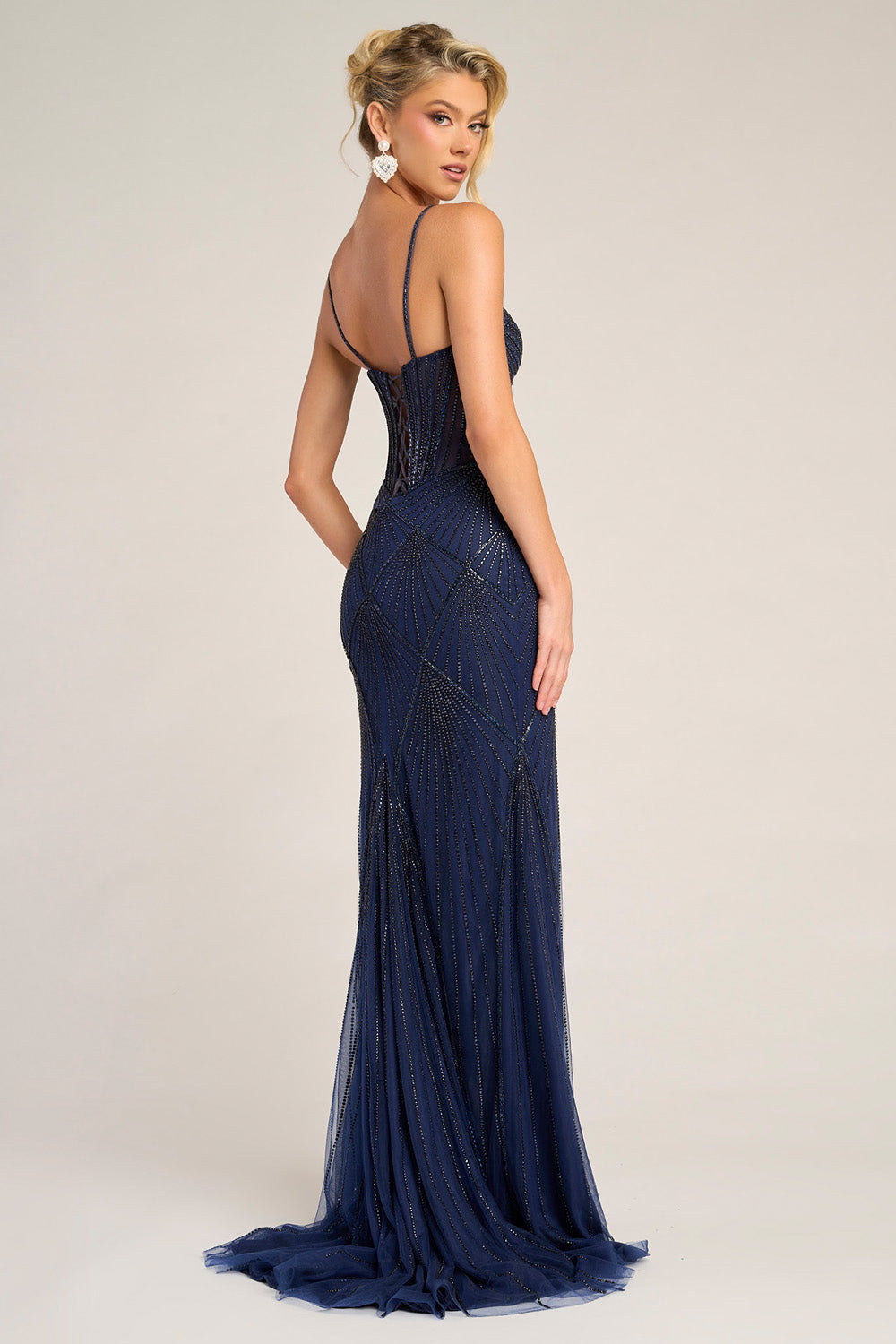 Portia and Scarlett PS26263 Navy mermaid prom dress with intricate beading and a stunning back view.