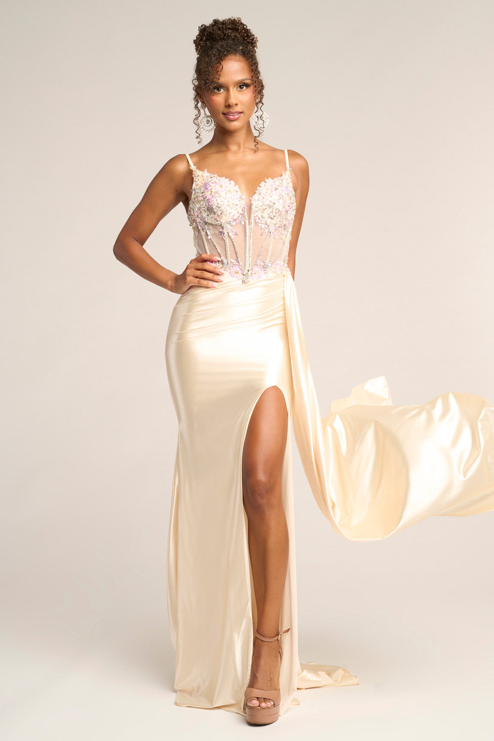 Portia and Scarlett PS26270 Cream prom dress with mermaid silhouette and side slit, featuring intricate beading.