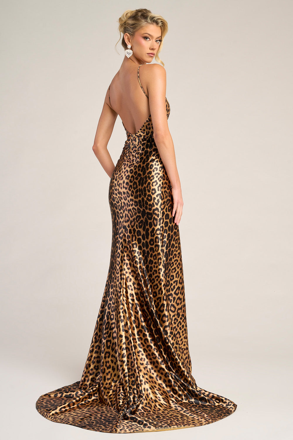 Portia and Scarlett PS26276 Leopard print mermaid prom dress with a stunning open back design.