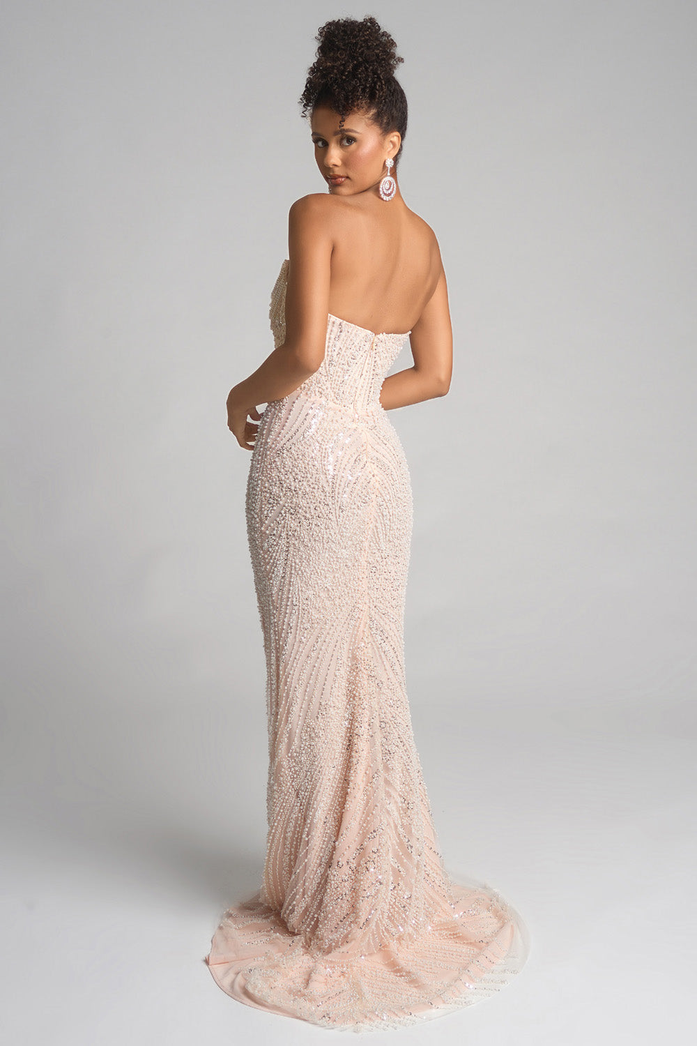 Portia and Scarlett PS26277 Champagne mermaid prom dress with intricate beading, back view.