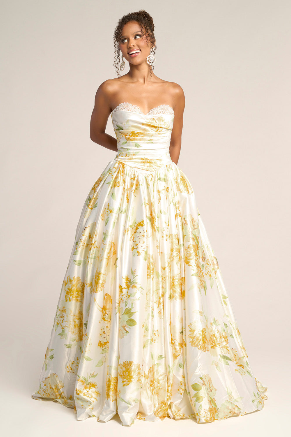 Portia and Scarlett PS26298 Strapless white and yellow floral ballgown with a flowing skirt, perfect for prom prom dress.
