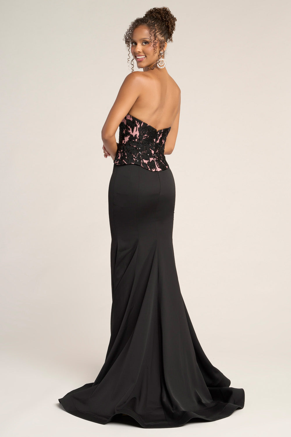 Portia and Scarlett PS26301e Black mermaid prom dress with a lace-up back and elegant floral detailing.