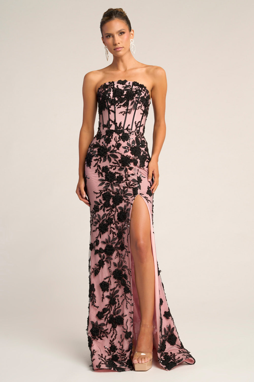 Portia and Scarlett PS26302e Strapless black pink mermaid prom dress with floral embroidery and thigh-high slit.