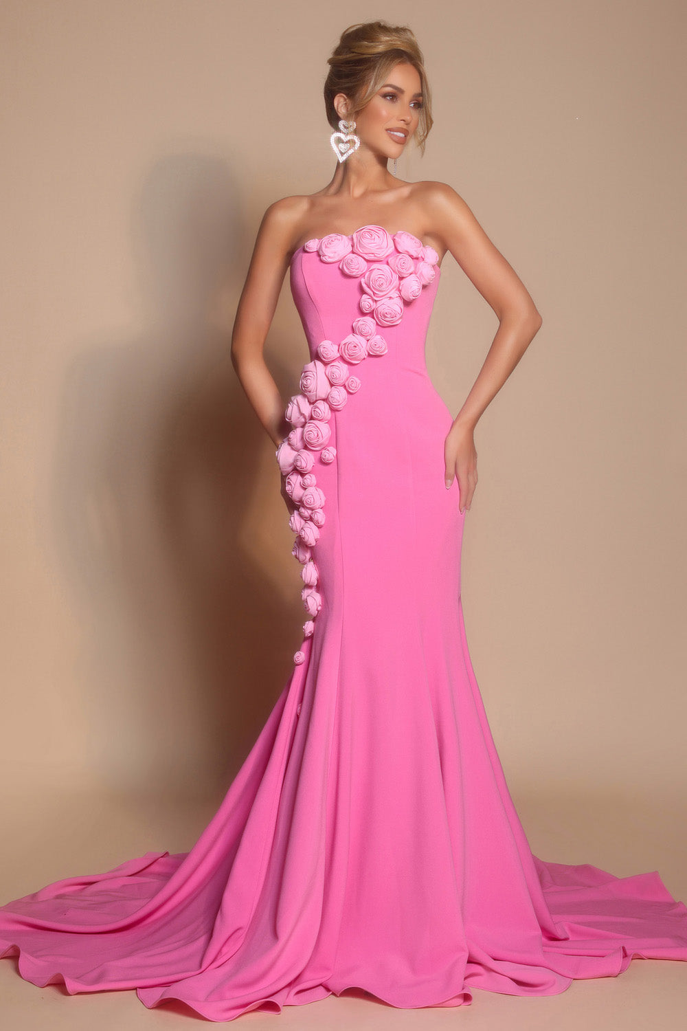 Portia and Scarlett PS26305e Pink mermaid prom dress with floral embellishments and a dramatic train.