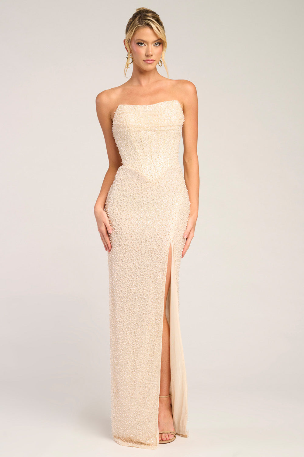Portia and Scarlett PS26309e Cream mermaid prom dress with a thigh-high slit and intricate beading, front view.