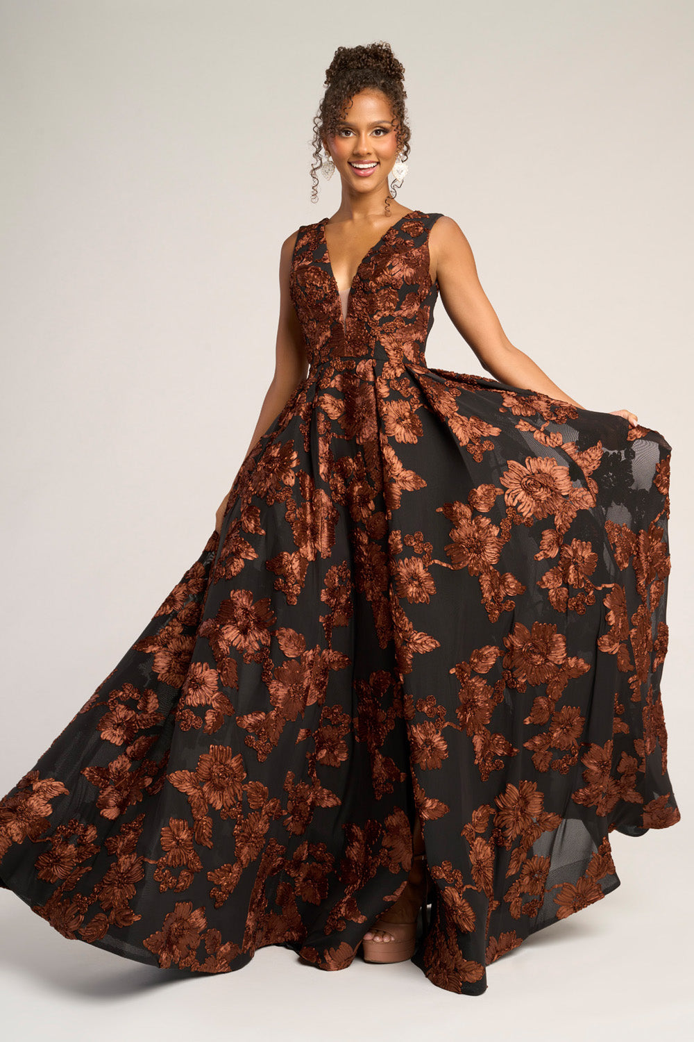 Portia and Scarlett PS26312e Black and brown floral prom dress with a fitted bodice and flowing A-line skirt.