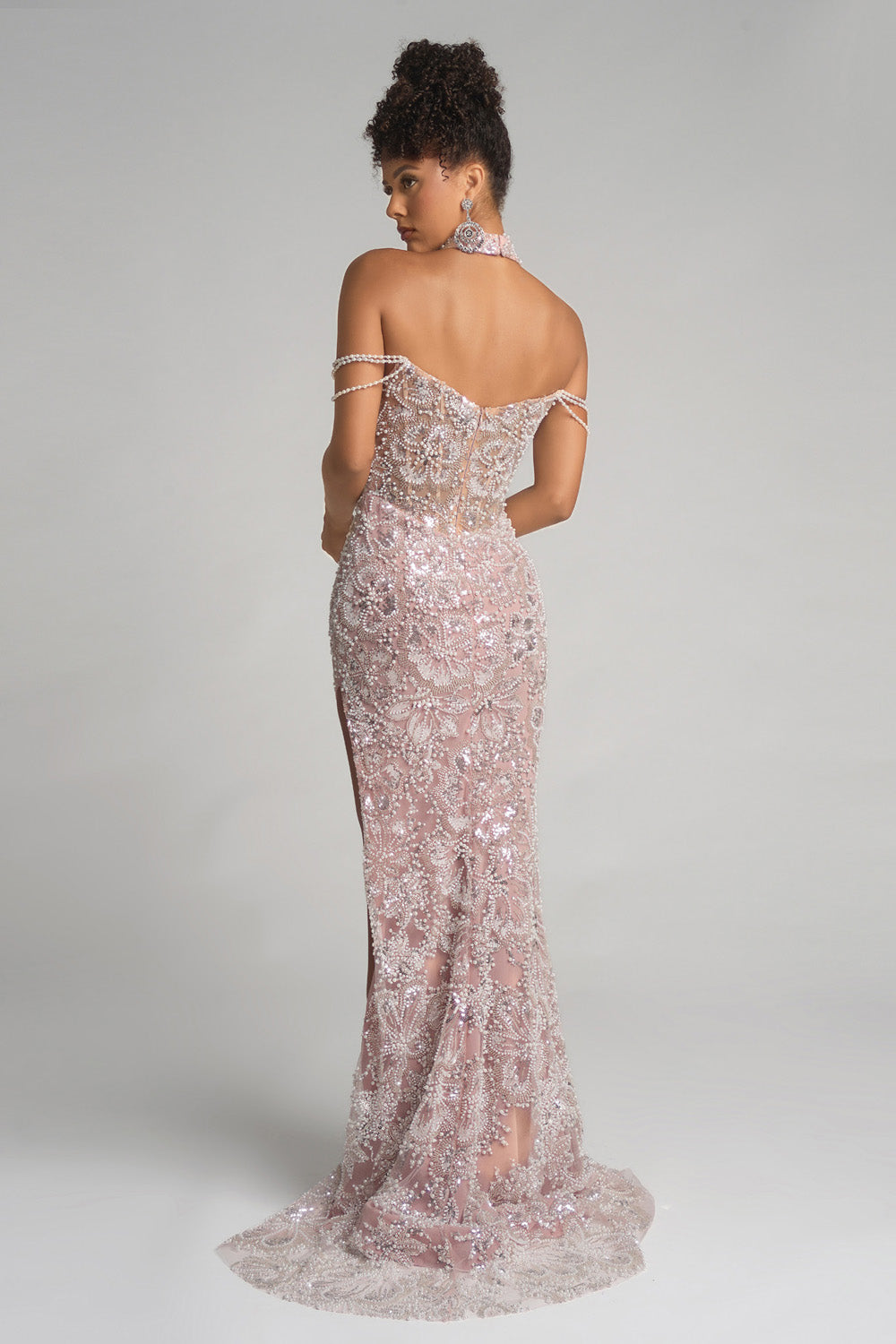 Portia and Scarlett PS26322e Ivory blush mermaid prom dress with intricate beading and a side slit.