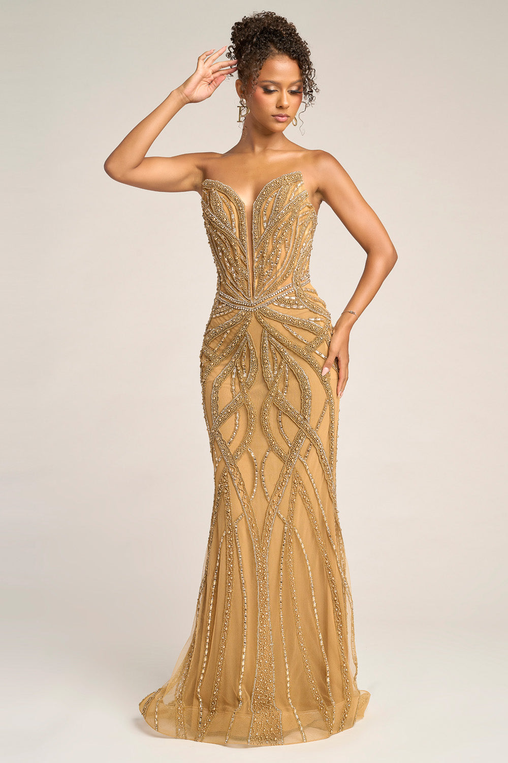 Portia and Scarlett PS26401c Gold mermaid prom dress with intricate beading and a sweetheart neckline.