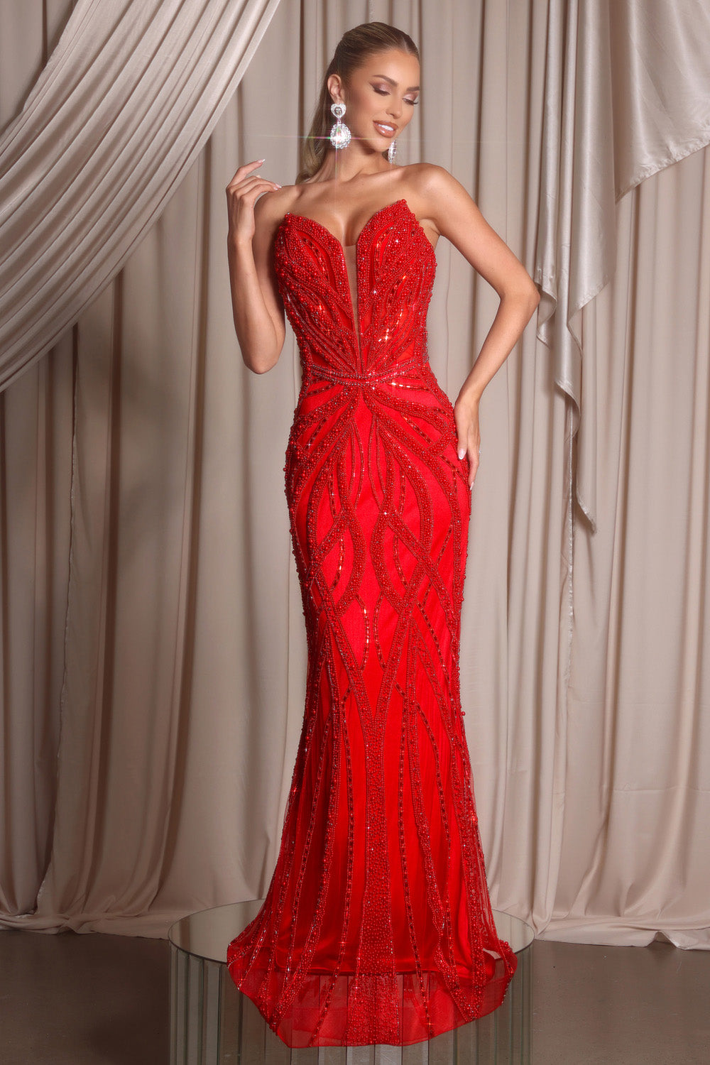 Portia and Scarlett PS26401c Red mermaid prom dress with intricate beading and a sweetheart neckline.