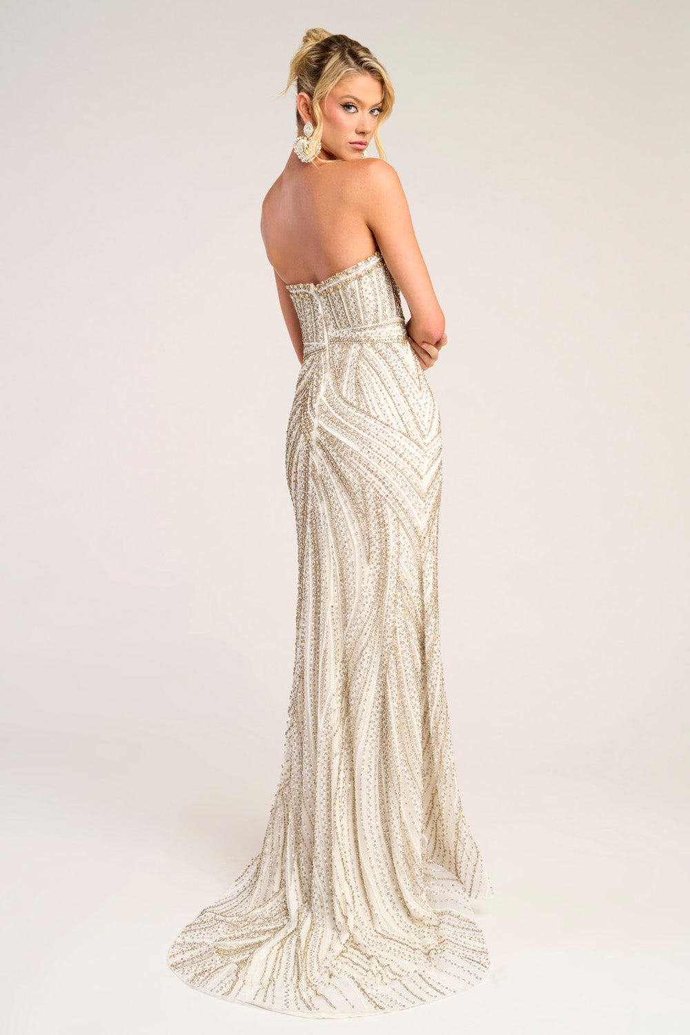 Portia and Scarlett PS26407c Ivory gold mermaid prom dress with stunning beading and a fitted silhouette.