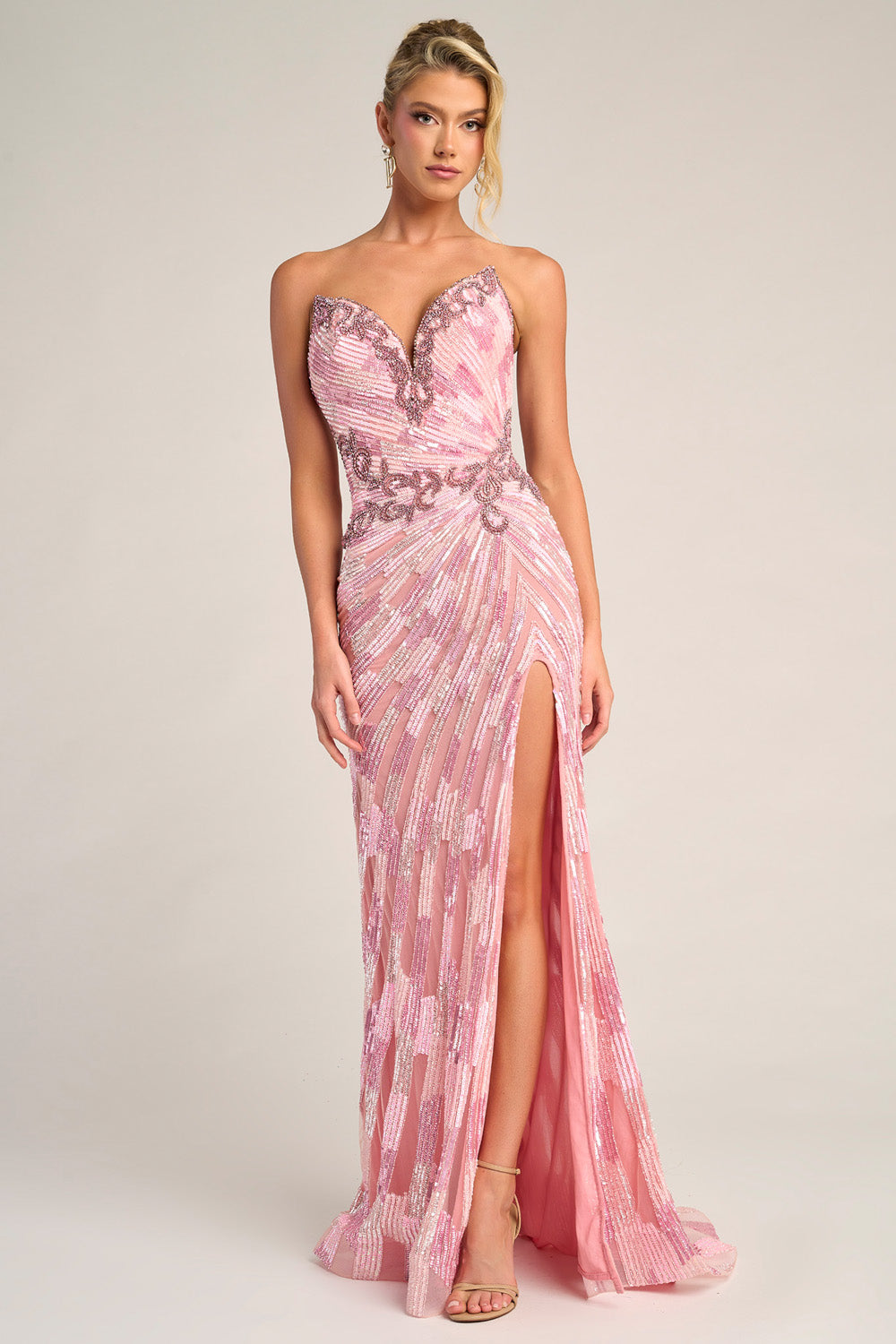 Portia and Scarlett PS26413c Pink mermaid prom dress with a thigh-high slit and intricate beading, front view.