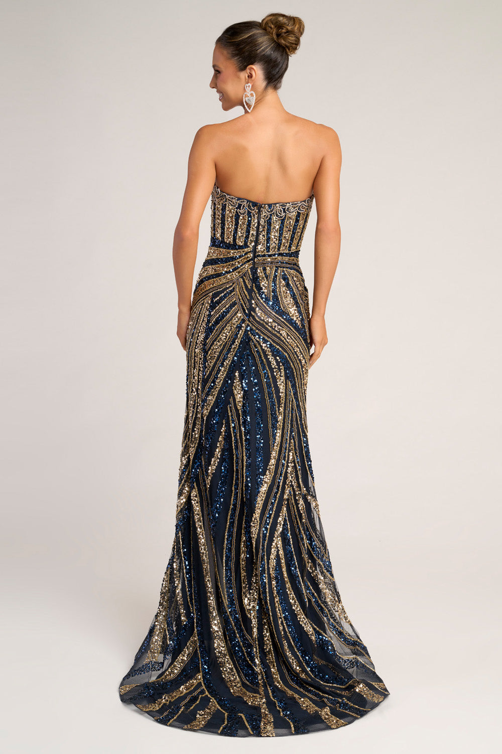 Portia and Scarlett PS26418c Navy gold mermaid prom dress with stunning sequins and a fitted silhouette.