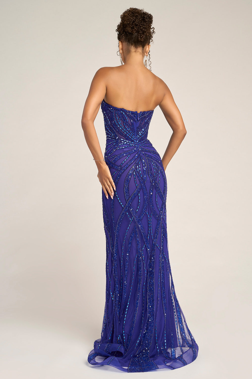 Portia and Scarlett PS26423c Cobalt mermaid prom dress with intricate beading, back view.