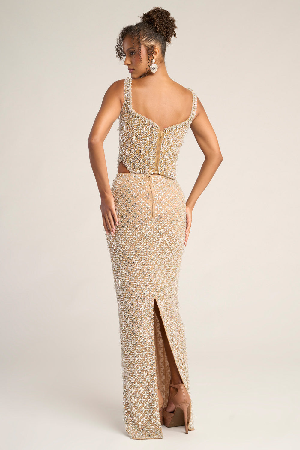 Portia and Scarlett PS26433c Nude silver mermaid prom dress with stunning beading and a side slit.