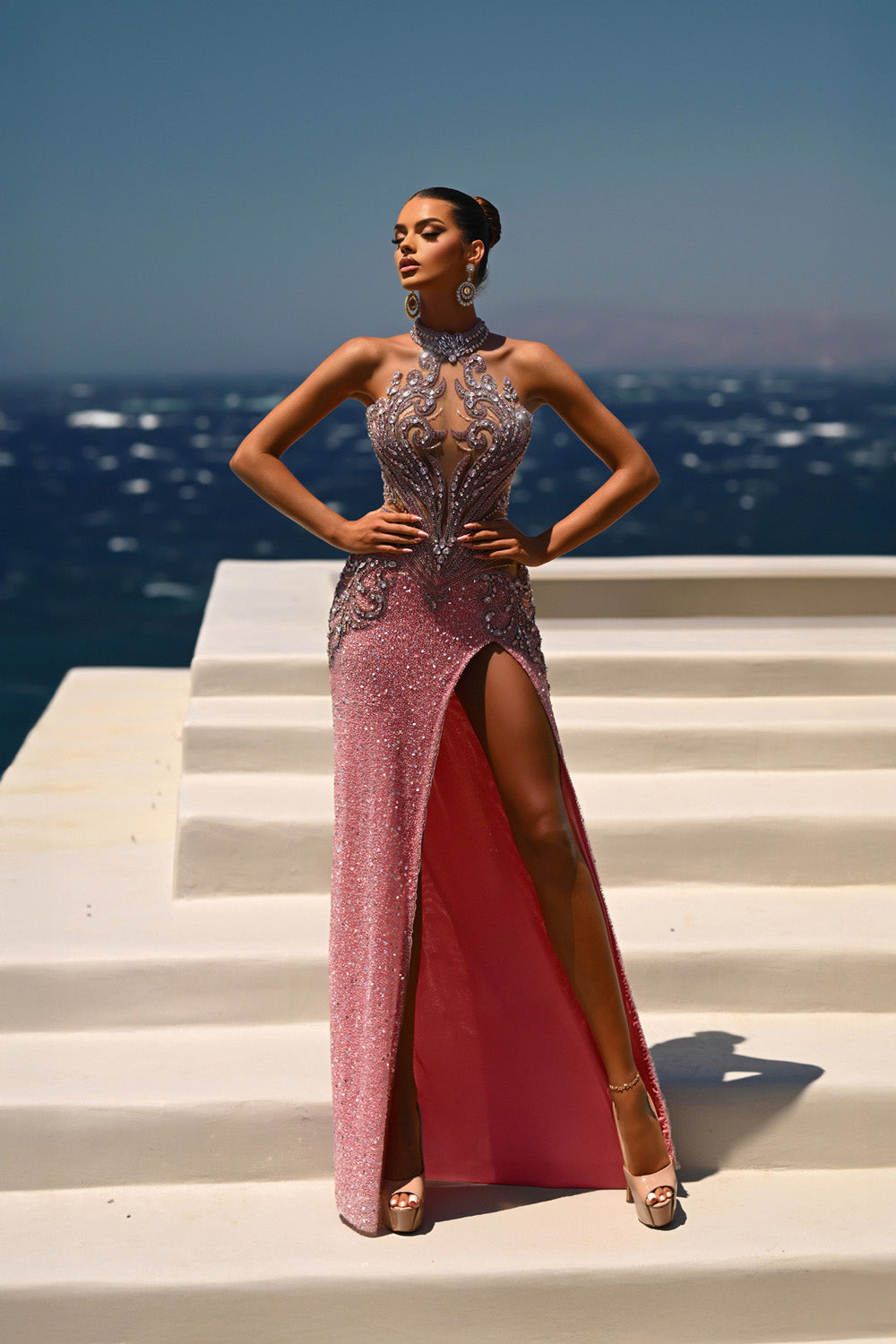 Portia and Scarlett PS26436c Pink silver mermaid prom dress with intricate beading and a thigh-high slit.