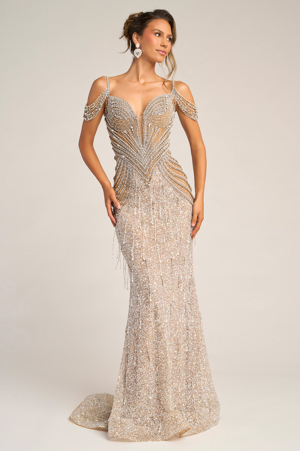 Portia and Scarlett PS26449c Nude silver mermaid prom dress with intricate beading and off-shoulder straps.