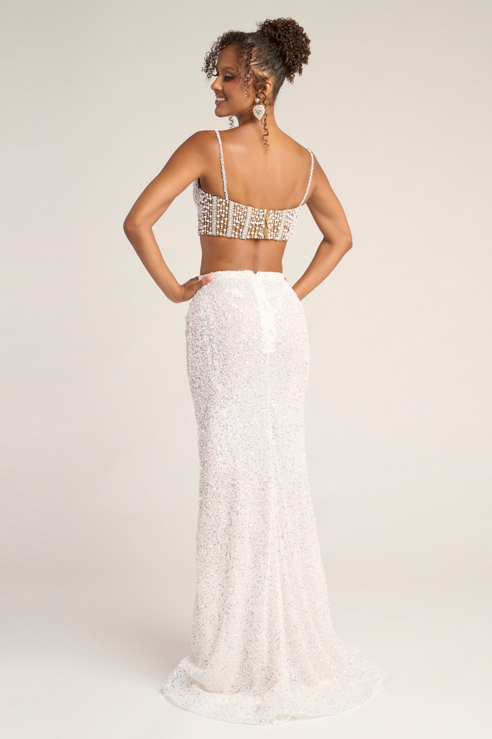 Portia and Scarlett PS26453c White nude mermaid prom dress with a beaded crop top and fitted silhouette.