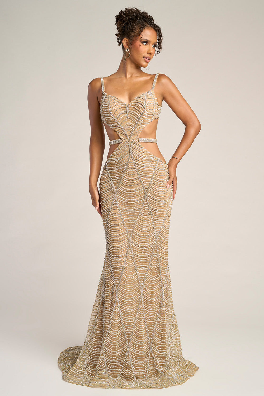 Portia and Scarlett PS26455c Nude silver mermaid prom dress with intricate beading and side cutouts.