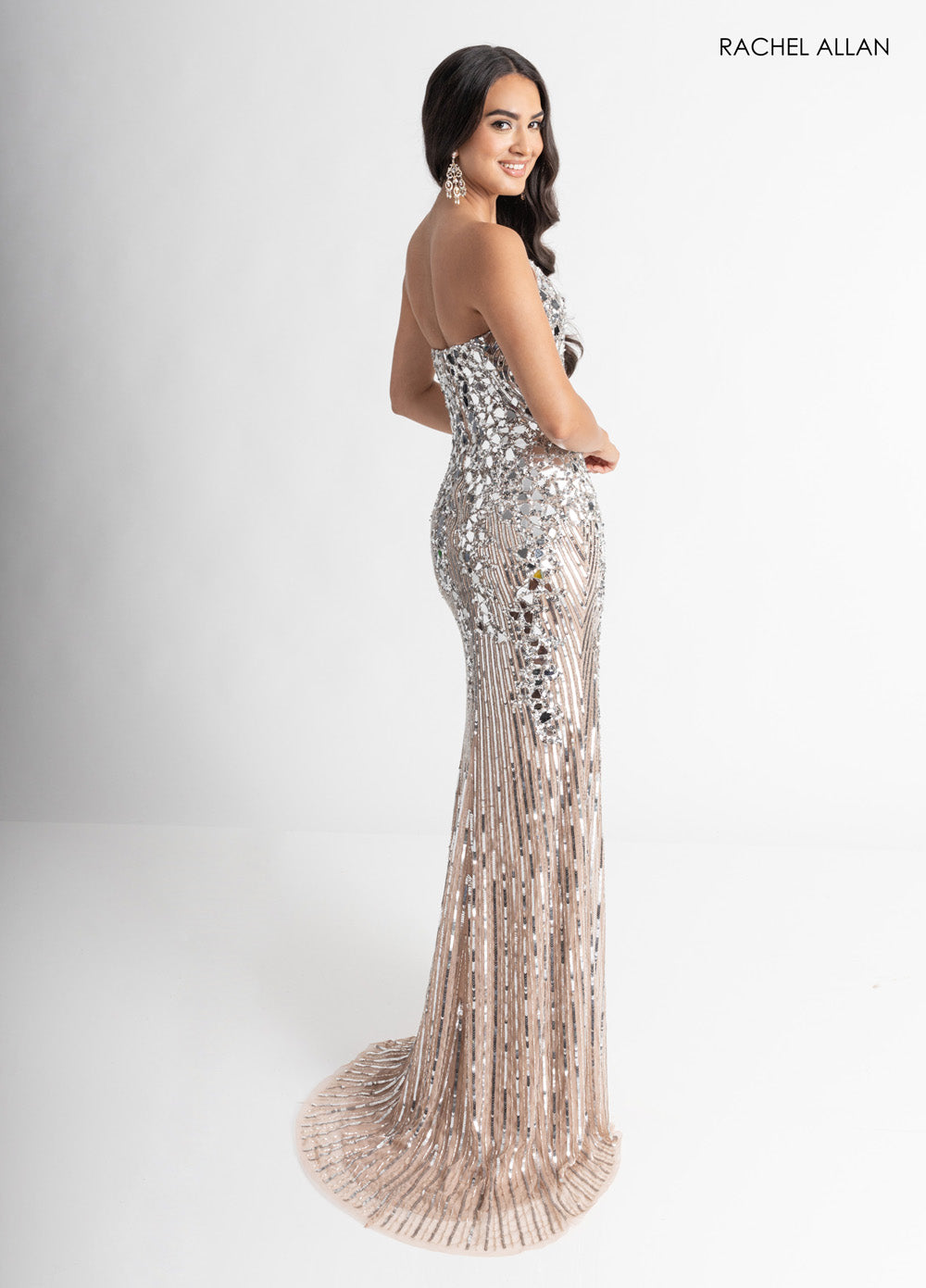 Rachel Allan 70937 Fitted nude silver prom dress with stunning beading and a mermaid silhouette.