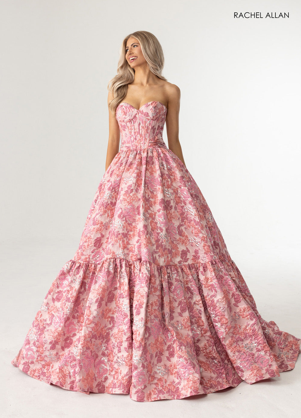 Rachel Allan 70939 Pink floral ballgown with corset bodice and full skirt, perfect for prom prom dress.