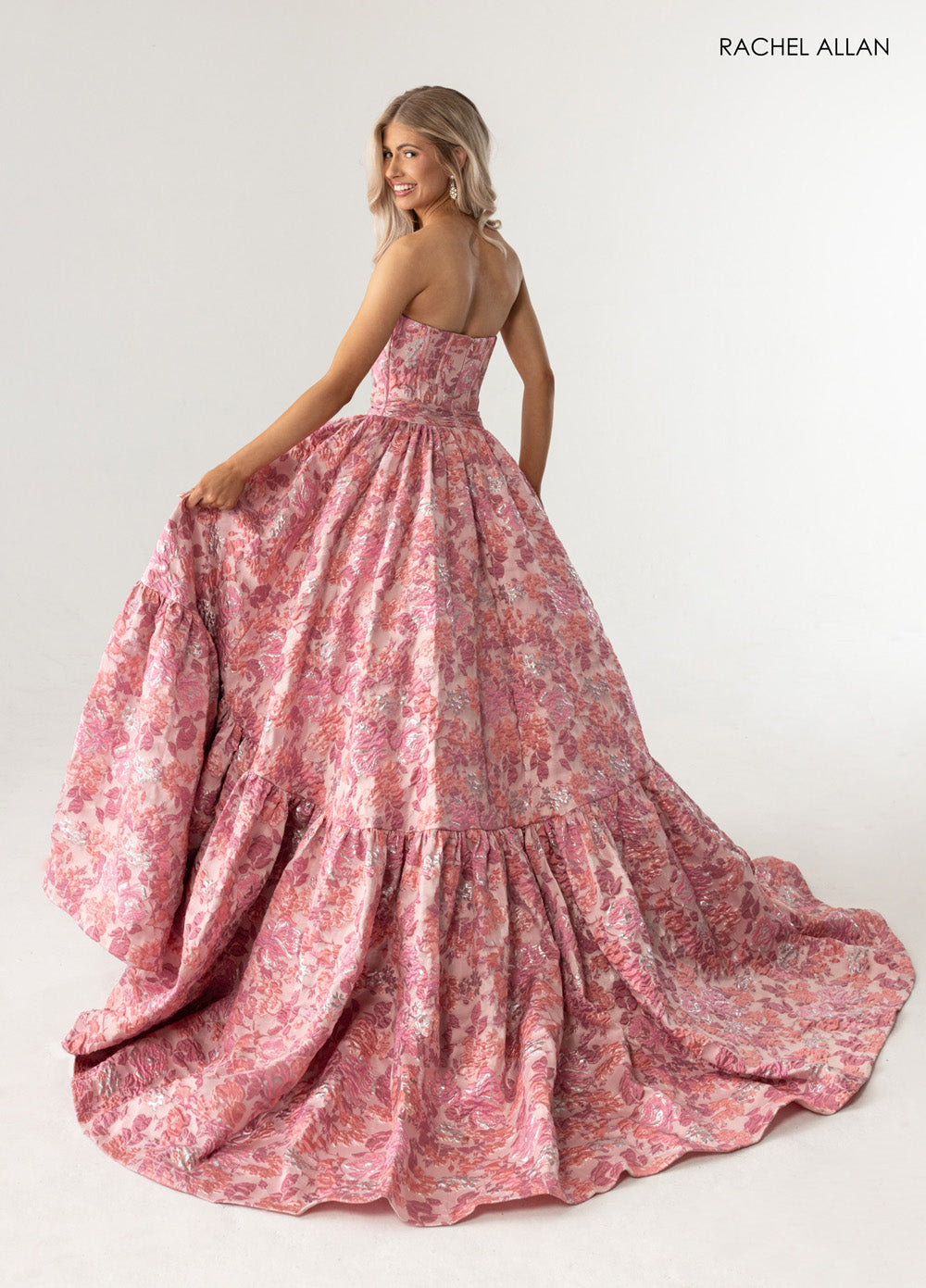 Rachel Allan 70939 Pink ballgown with corset bodice and flowing skirt, perfect for prom prom dress.