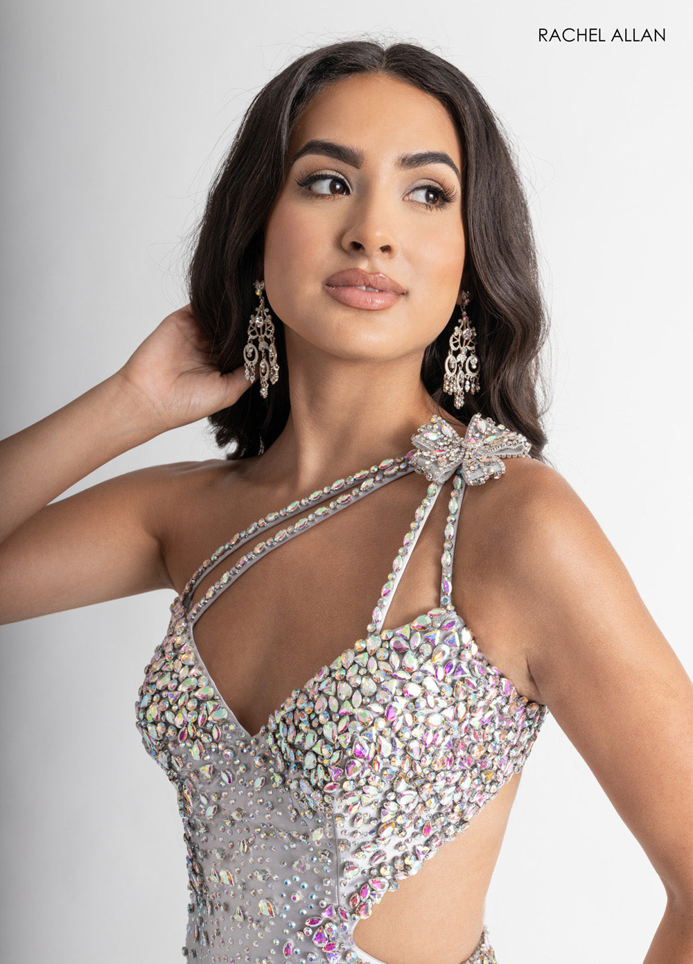 Rachel Allan 70943 Silver prom dress with corset bodice and crystal beading, close-up view.