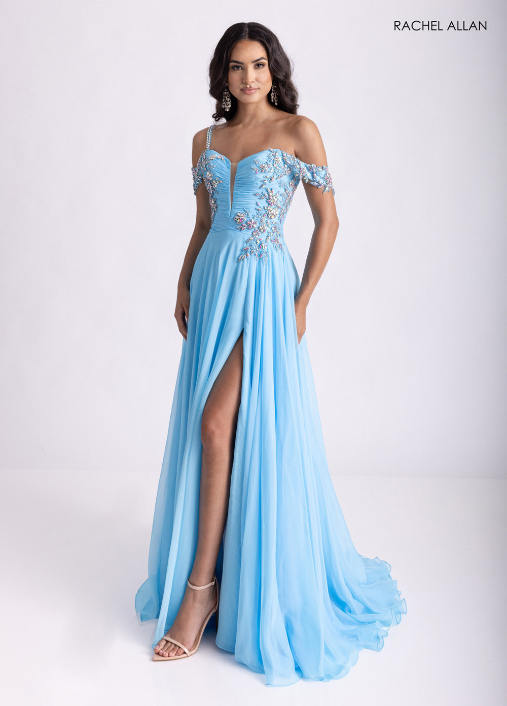 Rachel Allan 70951 Sky blue prom dress with corset bodice and high slit, featuring delicate beading.