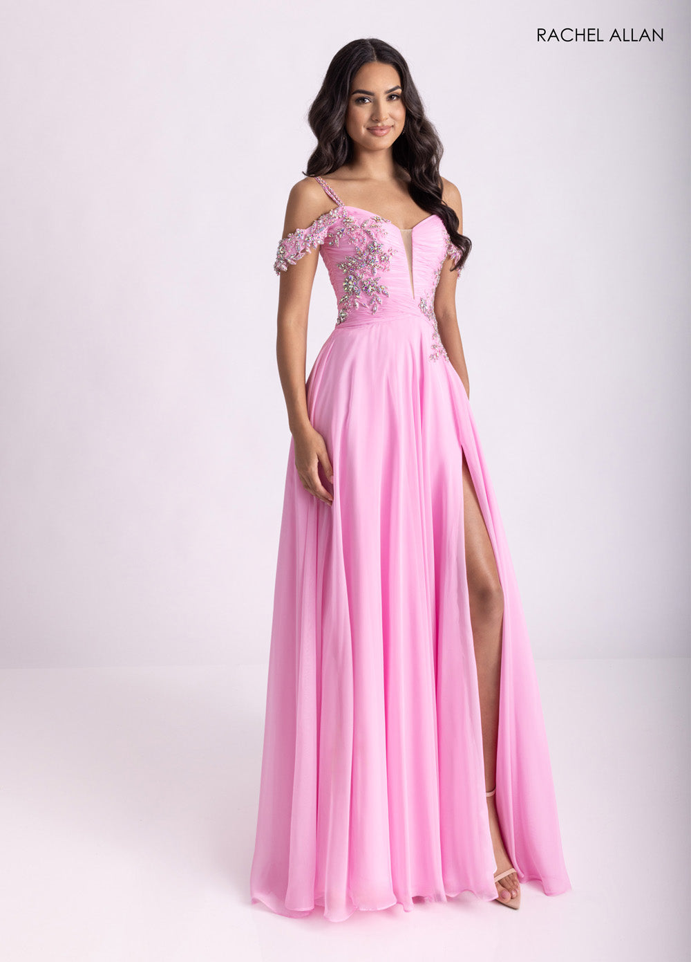 Rachel Allan 70951 Pink A-line prom dress with crystal beading and a thigh-high slit, front view.