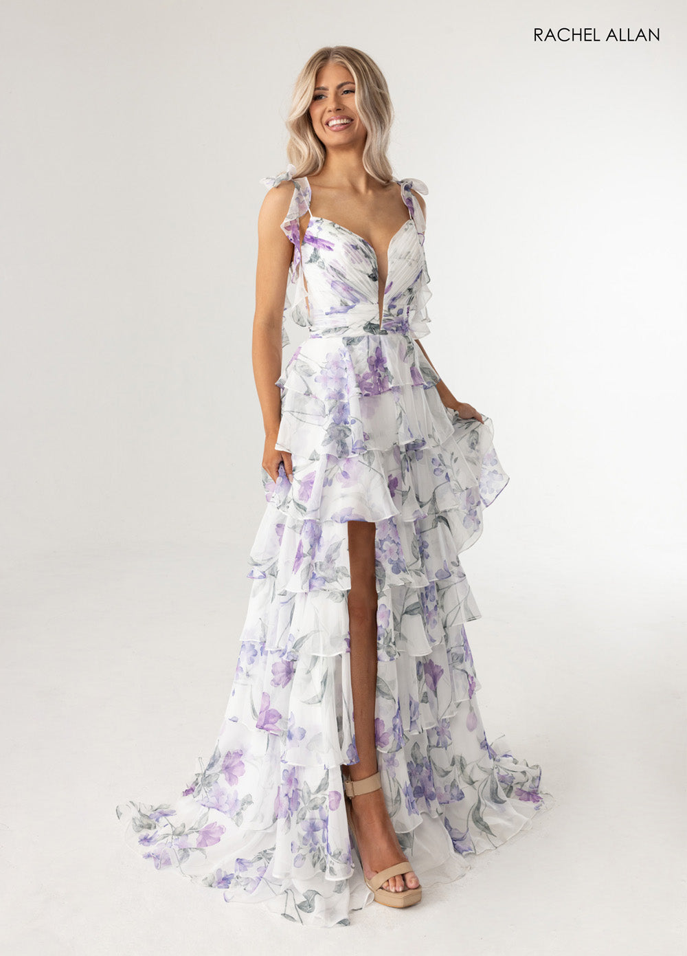 Rachel Allan 70953 Floral print prom dress in white with a plunging V and lace-up back.