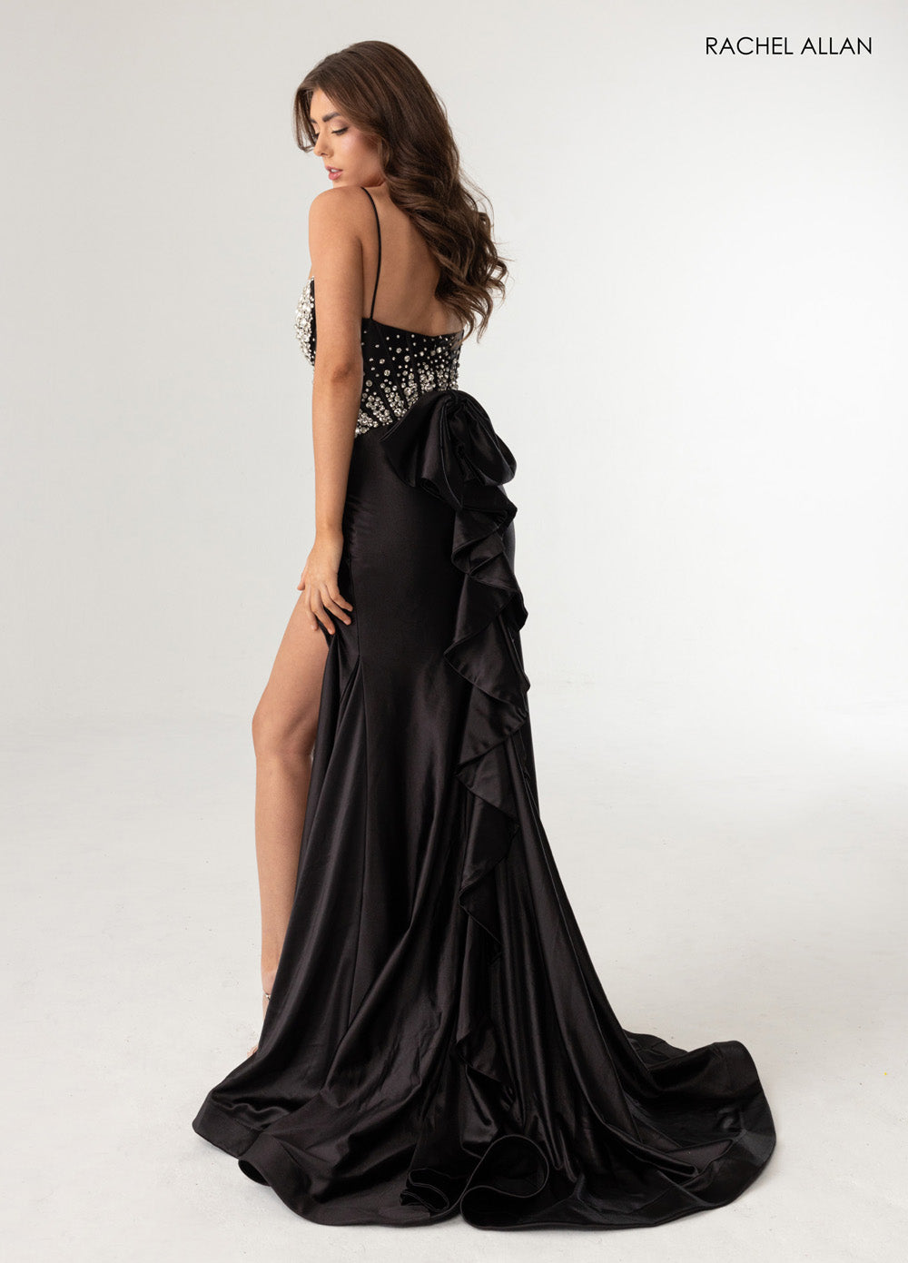 Rachel Allan 70971 Black mermaid prom dress with crystal beading and a thigh-high slit.