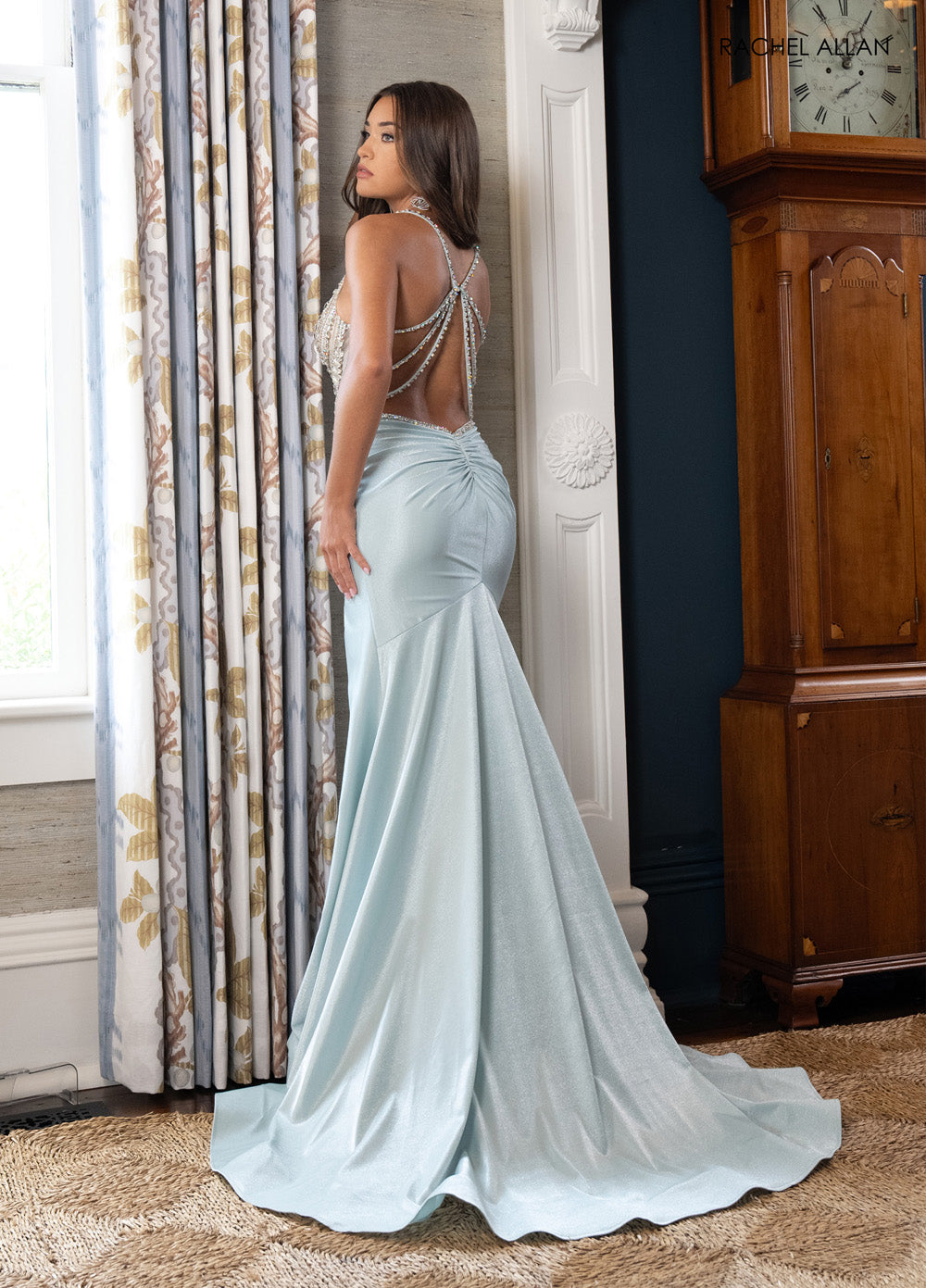 Rachel Allan 70983 Lilac mermaid prom dress with crystal beading and lace-up low back, back view.