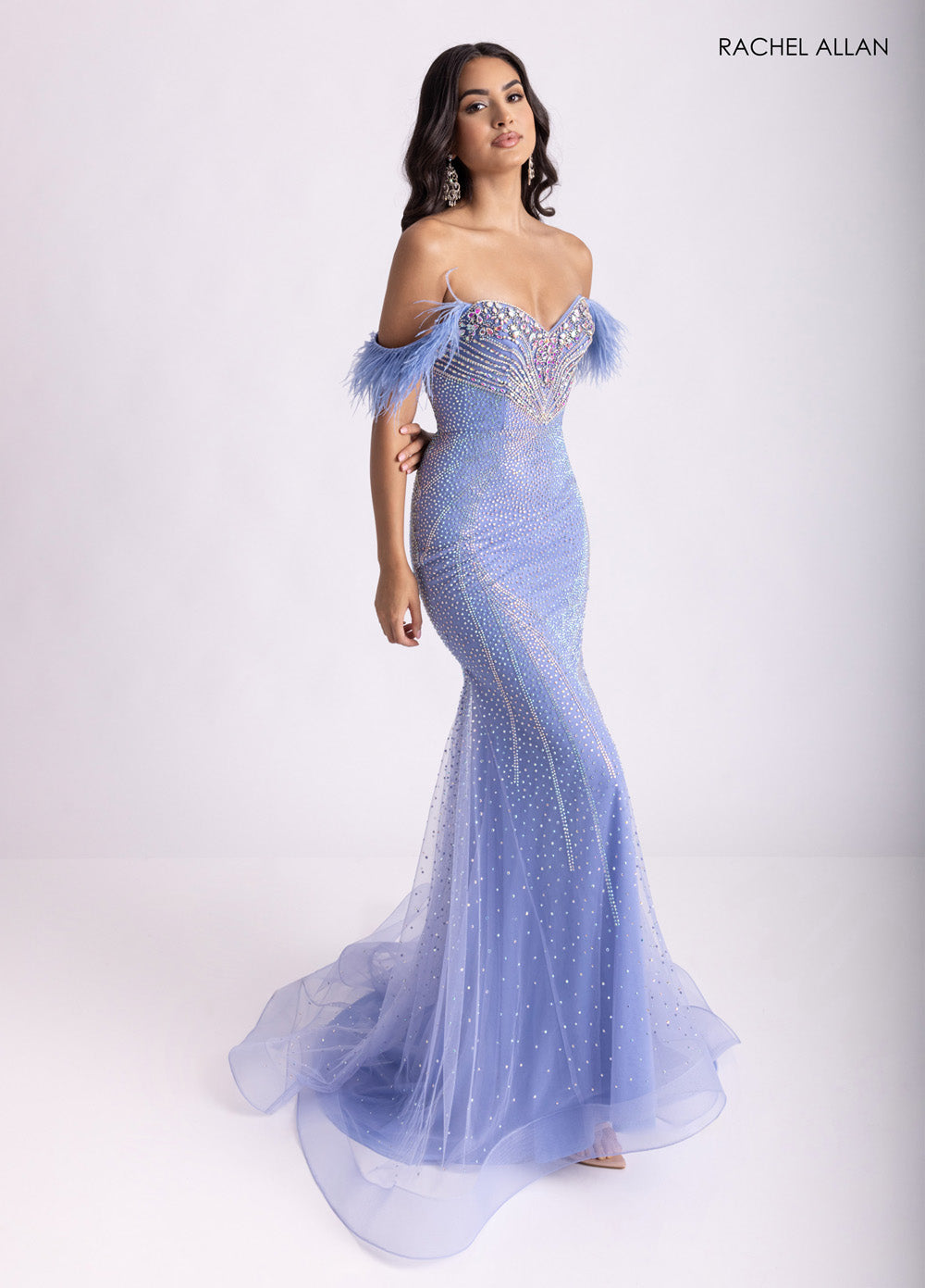 Rachel Allan 70984 Periwinkle mermaid prom dress with crystal beading and feathered off-shoulder detail.