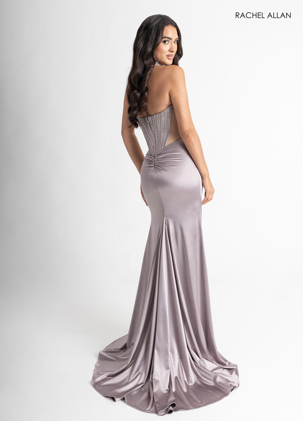 Rachel Allan 70994 Fitted gunmetal prom dress with crystal beading and a dramatic train, back view.