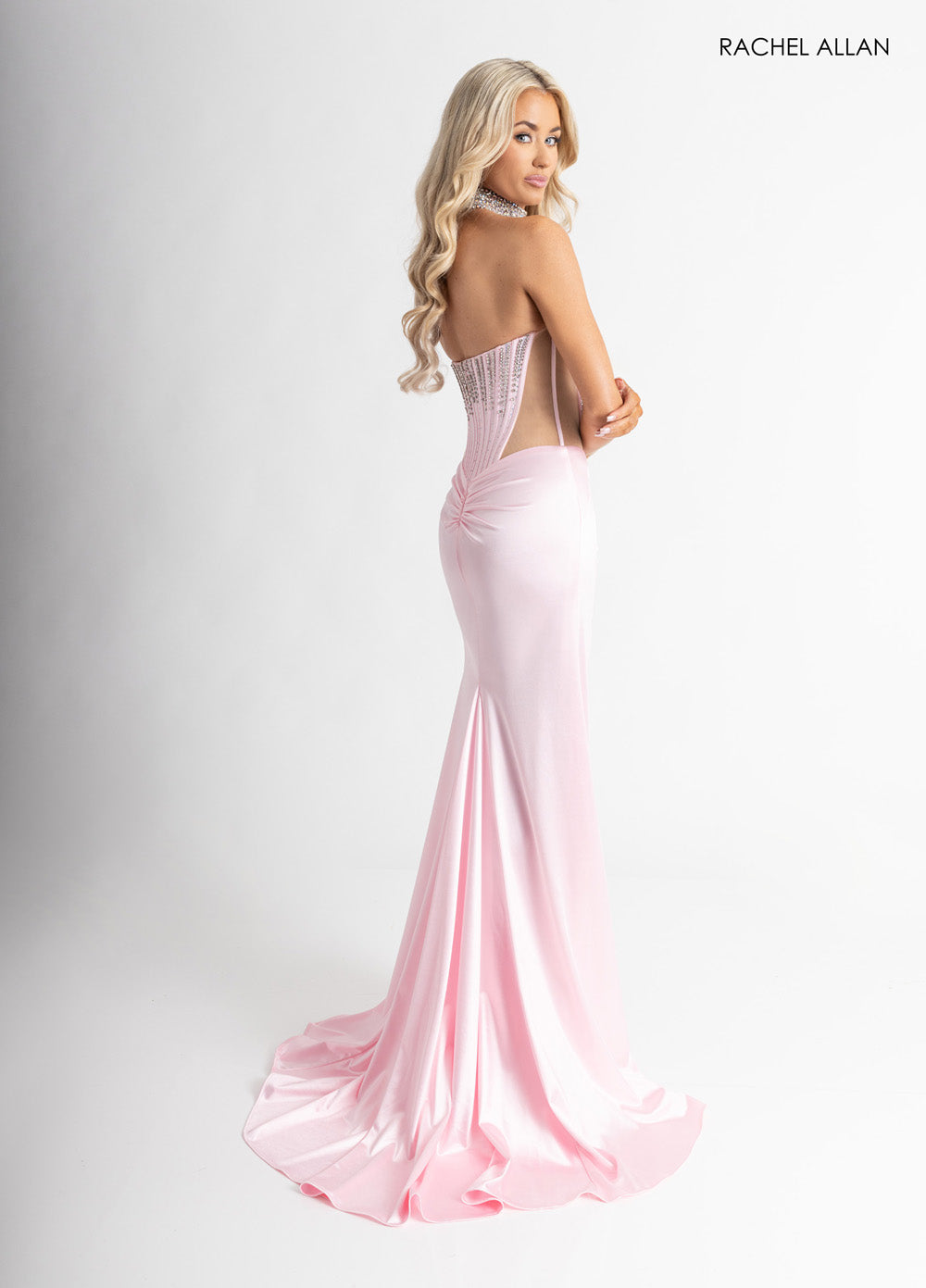 Rachel Allan 70994 Pink mermaid prom dress with corset bodice and crystal beading, back view.