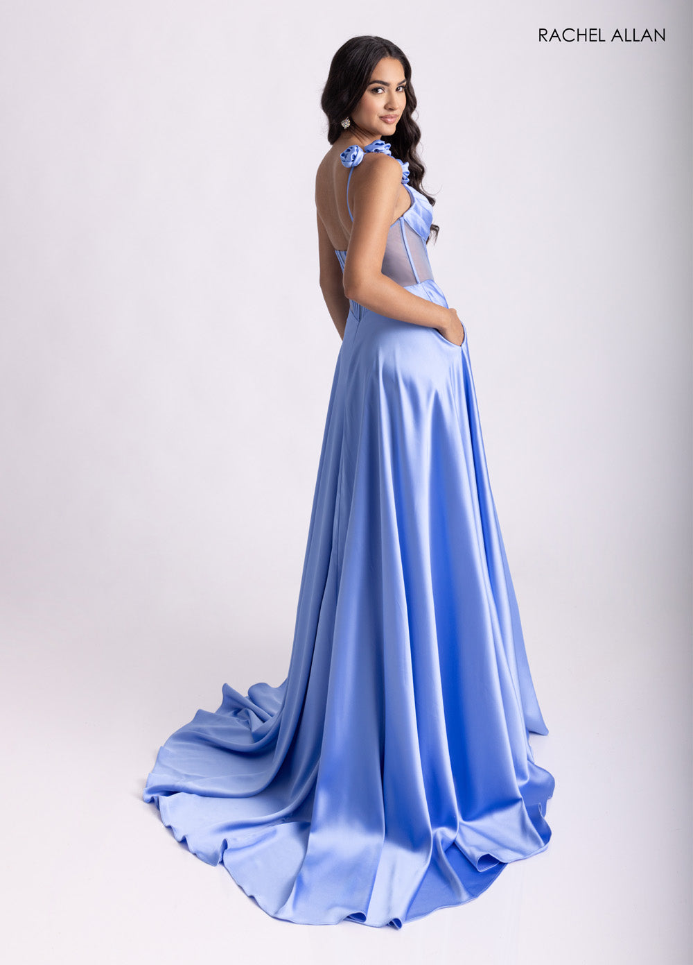 Rachel Allan 71004 Light blue formal gown with a corset bodice and stunning straps.