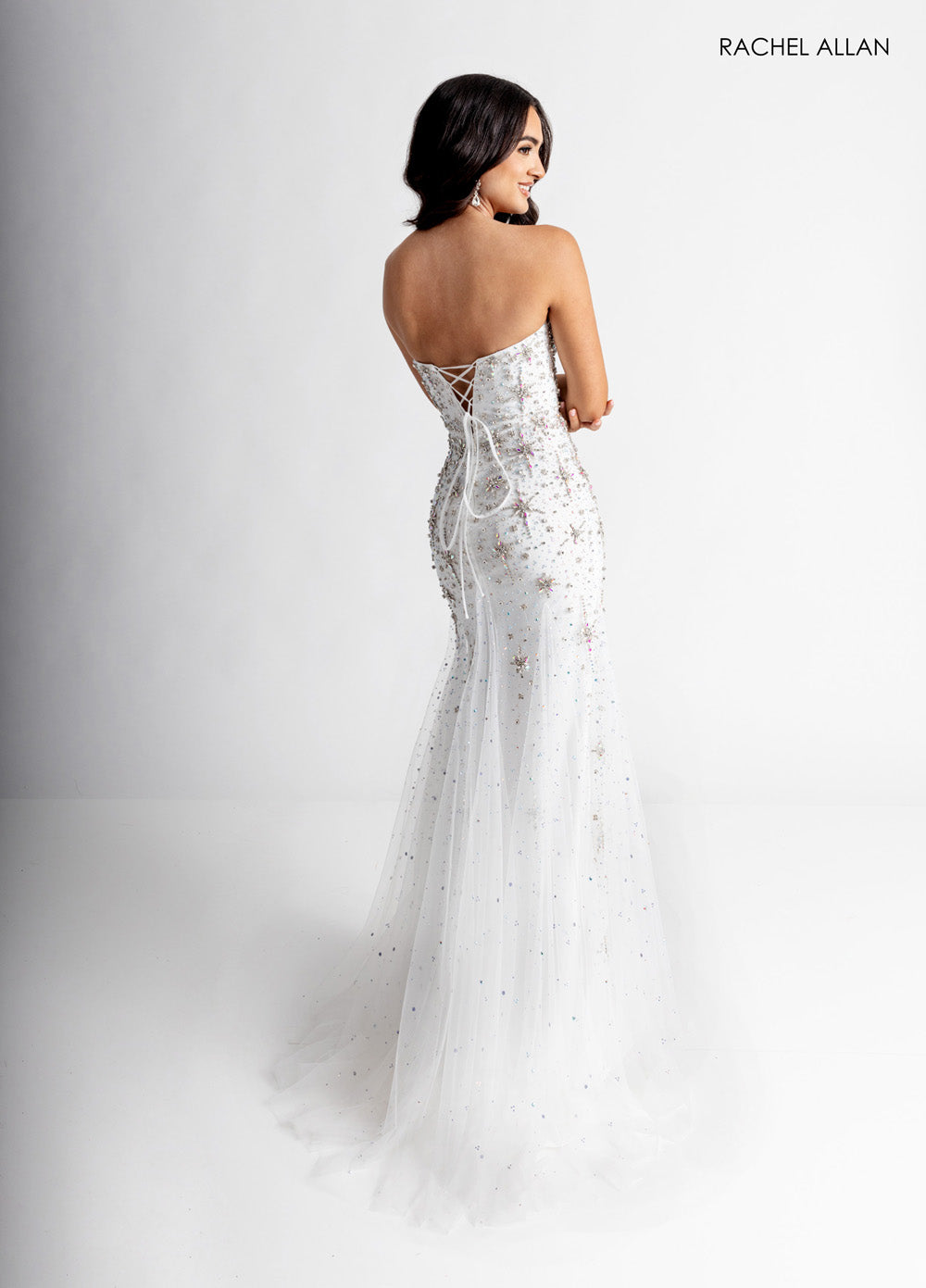 Rachel Allan 71013 White mermaid prom dress with crystal beading and lace-up back, back view.