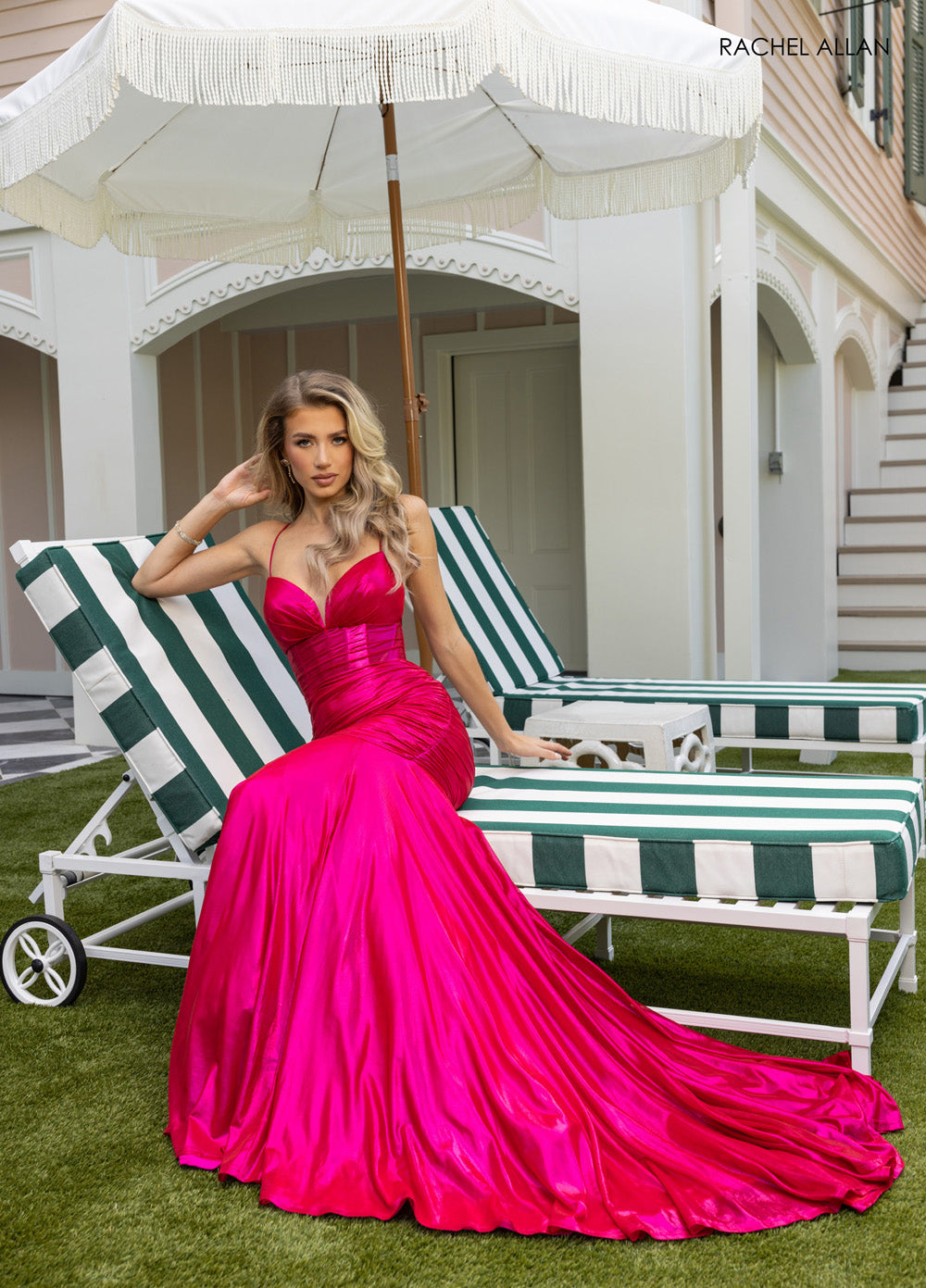 Rachel Allan 71040 Hot pink mermaid prom dress with a sleek silhouette and elegant train.