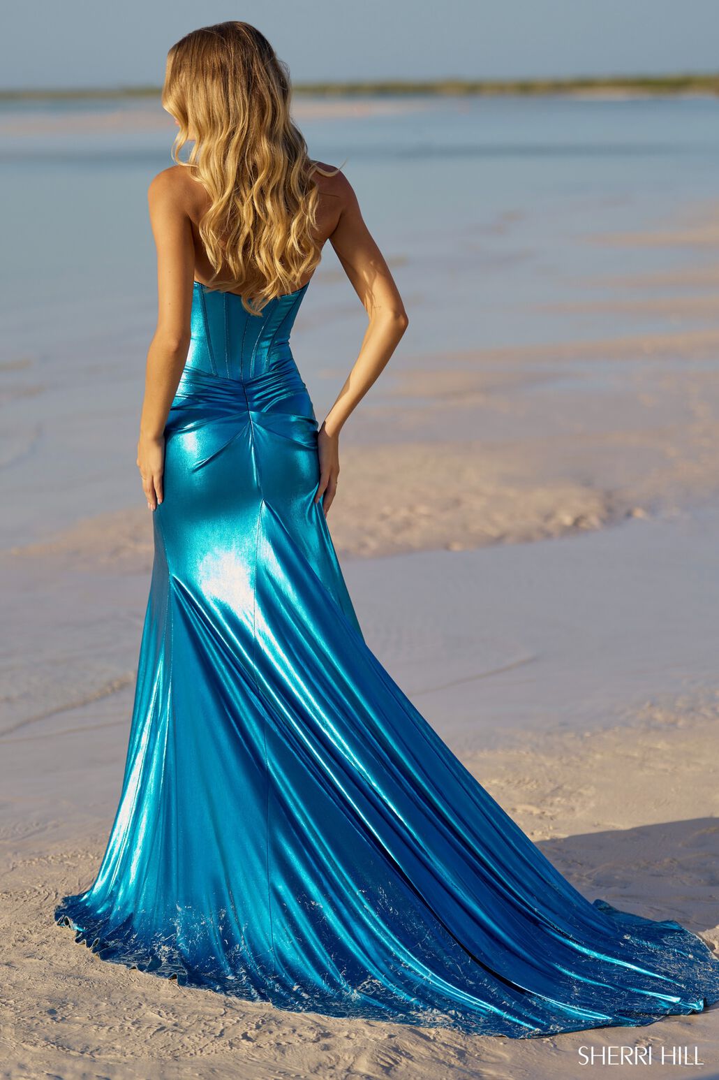 Sherri Hill 56085 prom dress images. Sherri Hill 56085 is available in these colors: Royal, Black, Magenta, Gold, Ocean Blue.