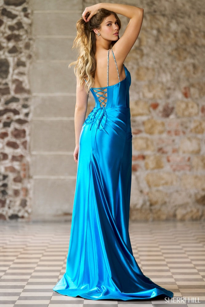 Sherri Hill 56430 prom dress images. Sherri Hill 56430 is available in these colors: Black, Candy Pink, Red, Emerald, Royal, Silver, Gold, Peacock, Navy, Magenta, Ivory.
