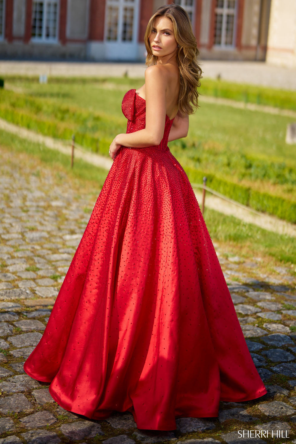 Sherri Hill 56900 prom dress images. Sherri Hill 56900 is available in these colors: Emerald, Fuchsia, Ivory, Navy, Red, Black, Royal.