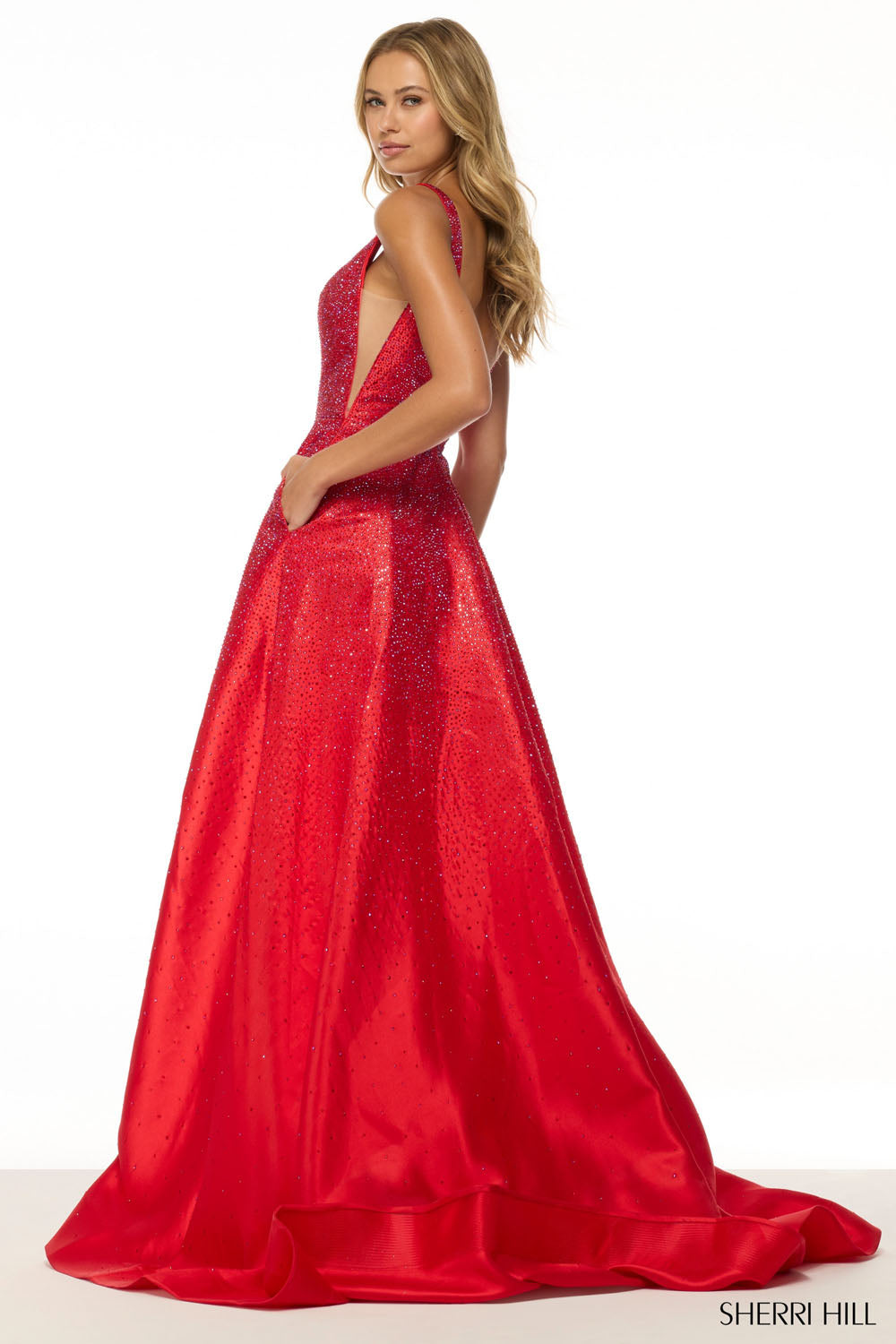 Sherri Hill 56990 prom dress images. Sherri Hill 56990 is available in these colors: Blush, Navy, Emerald, Fuchsia, Black, Royal, Red, Peacock, Ice Blue, Ivory, Yellow.