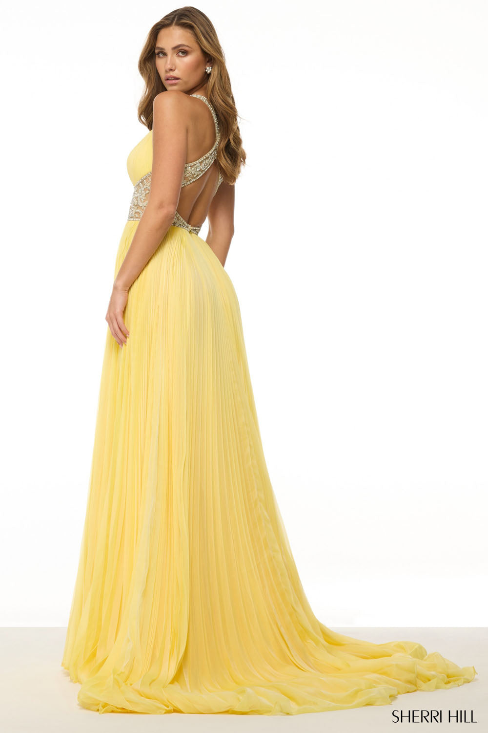 Sherri Hill 57054 prom dress images. Sherri Hill 57054 is available in these colors: Navy, Strawberry, Purple, Yellow, Periwinkle, Orange, Berry.